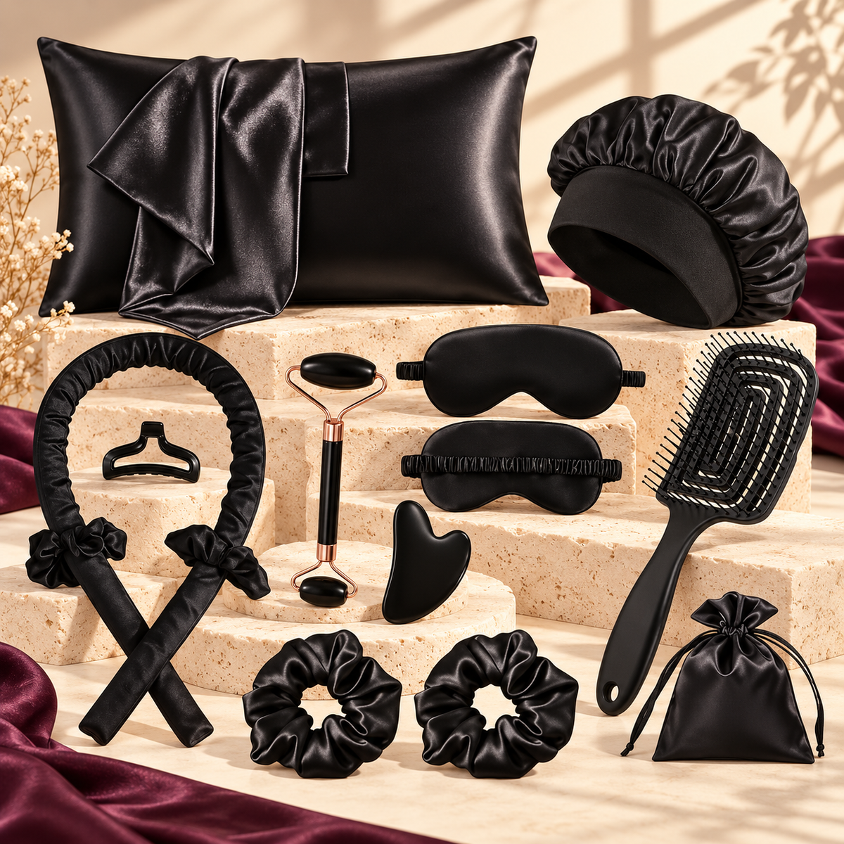 Midnight Curl and Glow 13-piece noir sleep and styling set on warm ivory travertine
